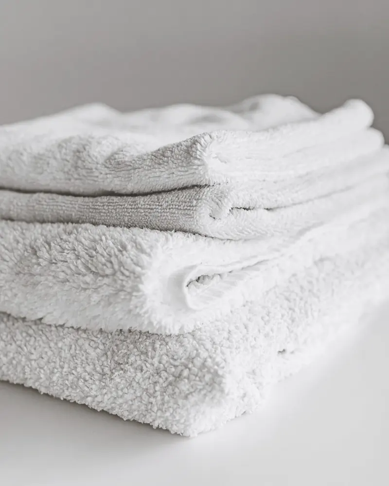A stack of folded white towels